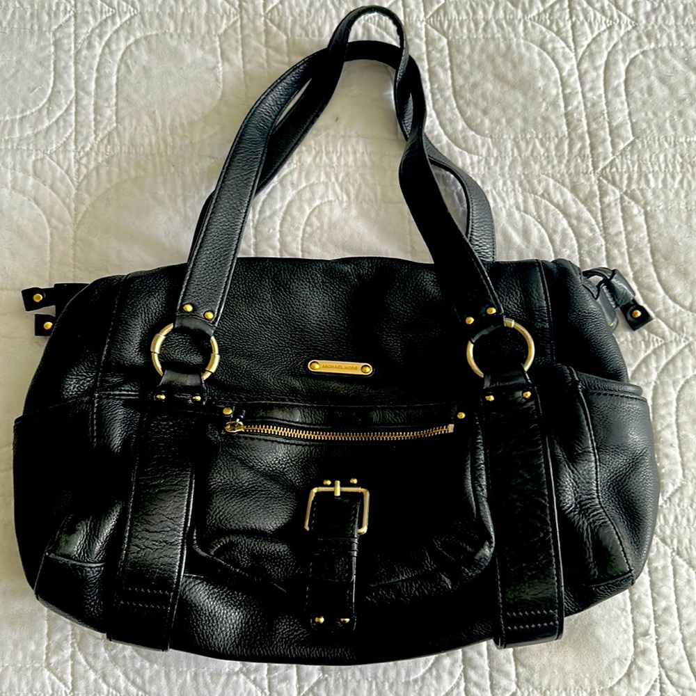 Michael Kors handbag. Black genuine leather with gold accents. Gently loved